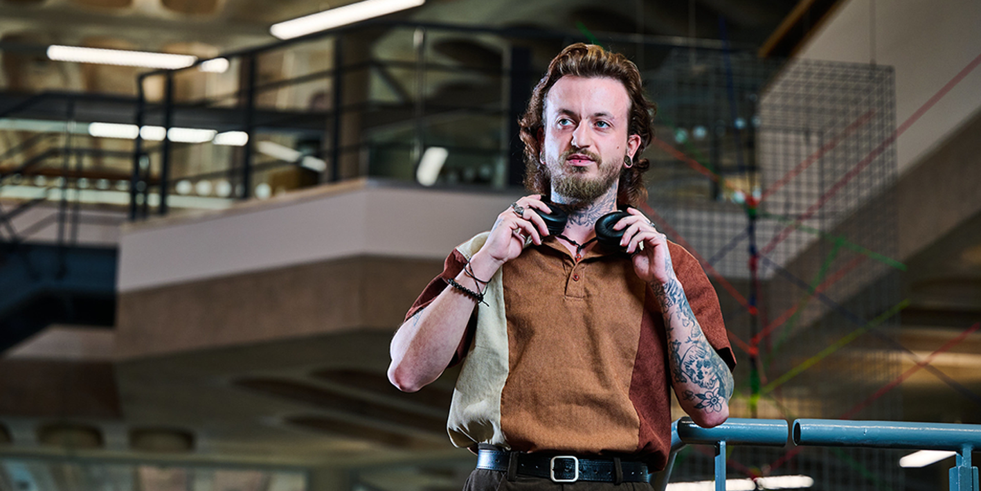 WLV male student in Alan Turing Building marketing image