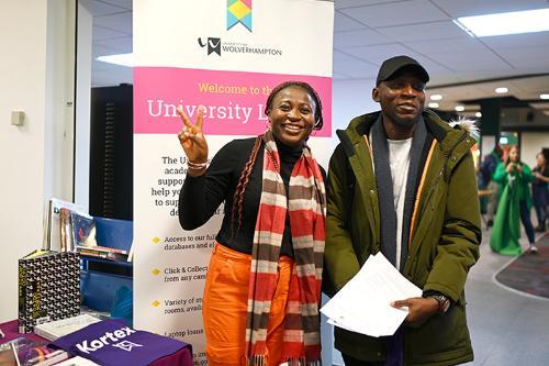 Students getting support from Library stall at City Refreshers Fair