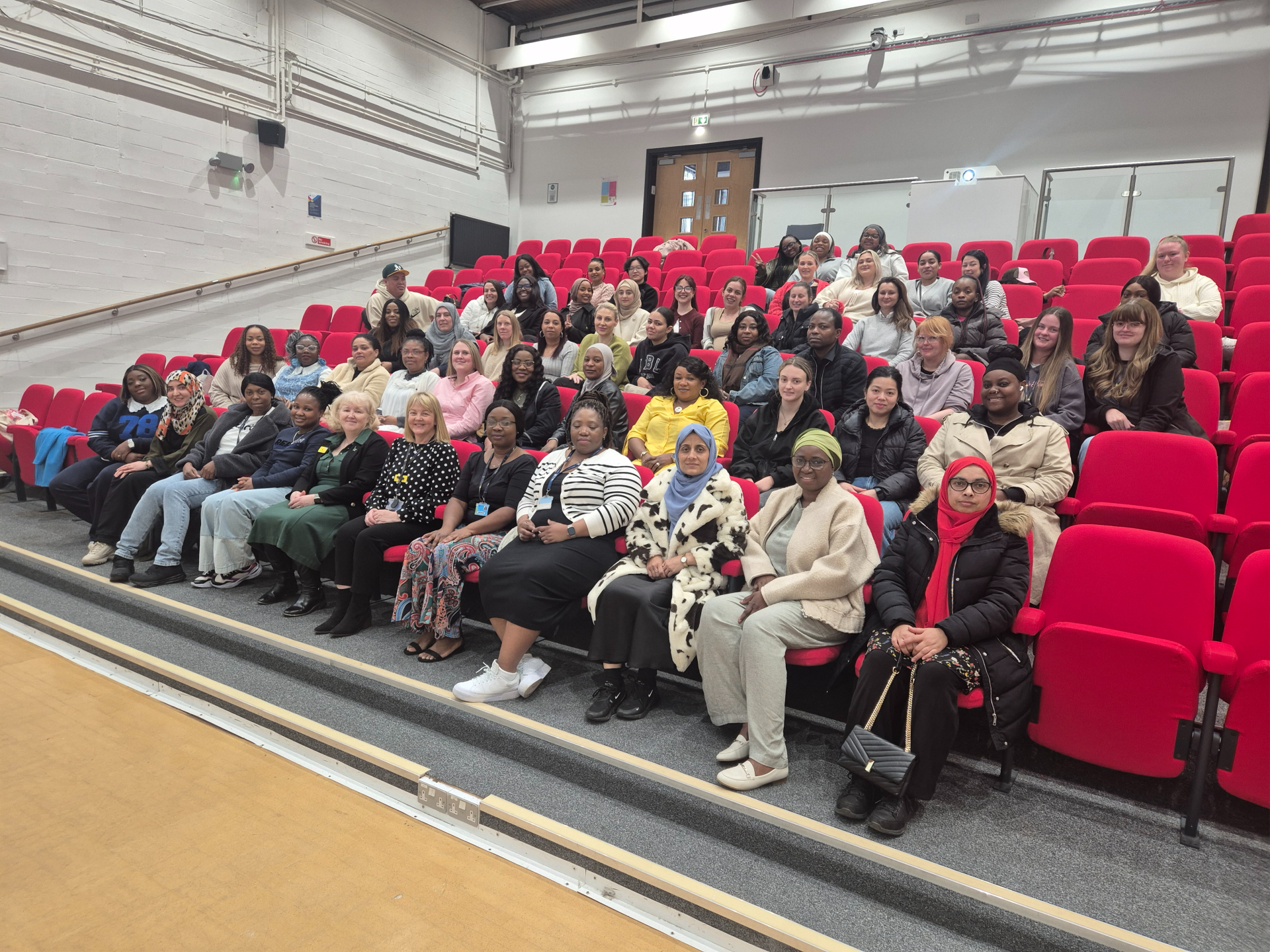 Students sitting in a lecture theatre