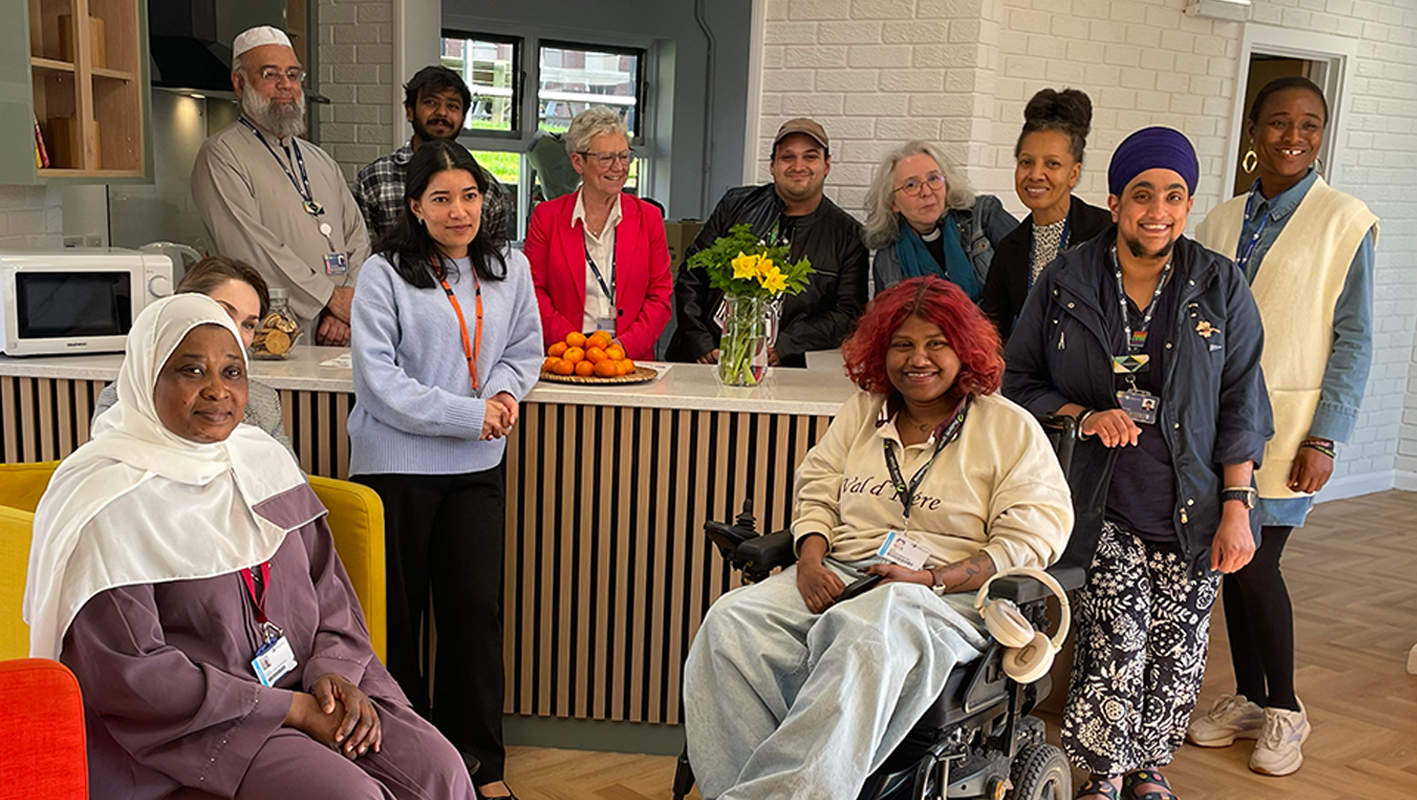 Group of Chaplaincy and Estates staff and students in the refurbished Chaplaincy