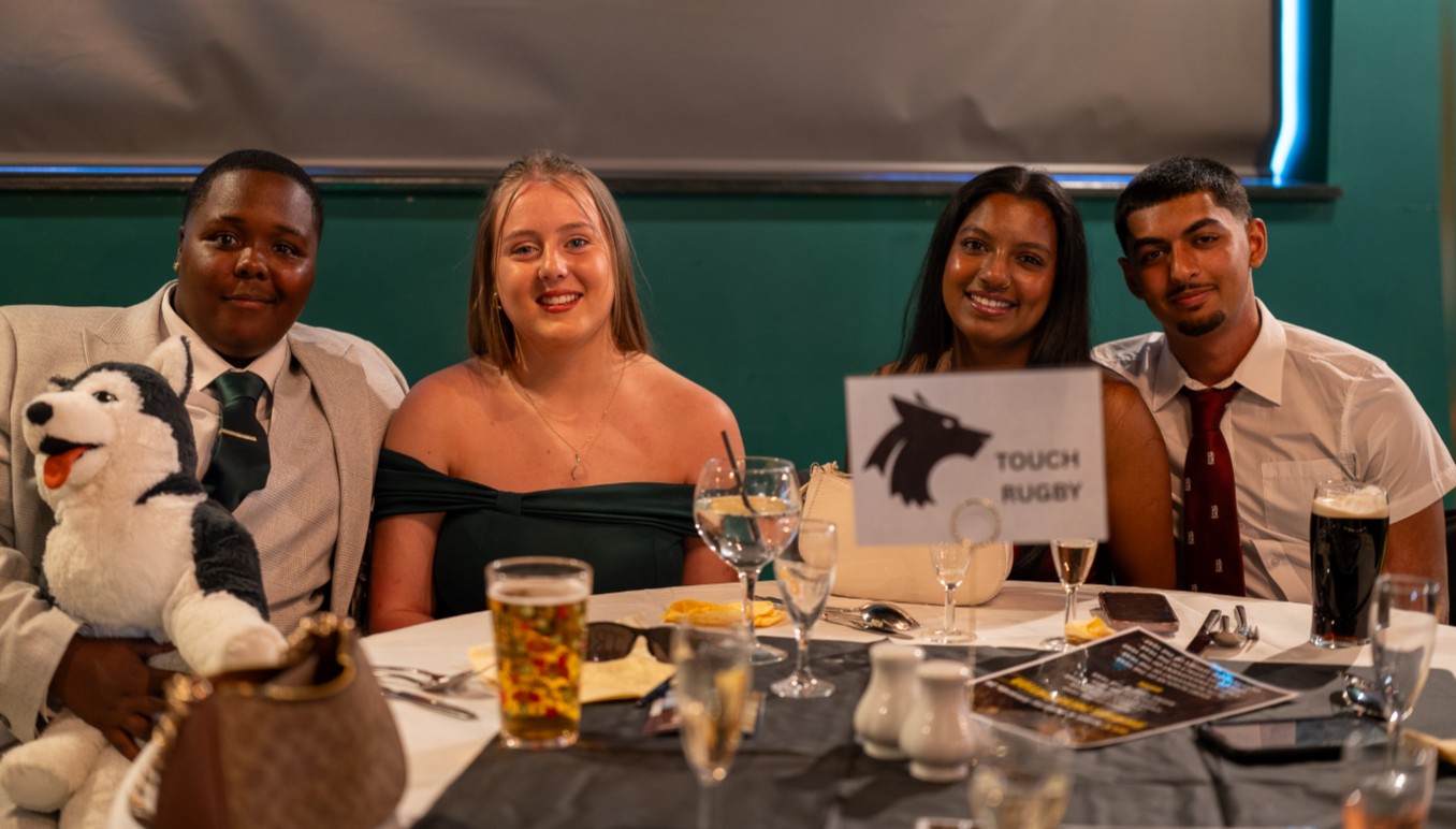 Students sitting around a table