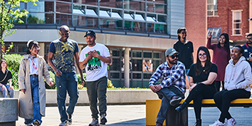 A group of international students in City campus courtyard