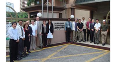 UOW reps staff from ICOM outside the international college of music in Kuala Lumpur