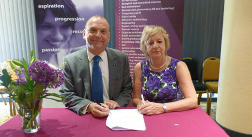 OCNWMR - Vice-Chancellor of the University of Wolverhampton, Professor Geoff Layer and CEO of the Open College Network West Midlands Region Chris Assheton signing the progression information documents agreement.