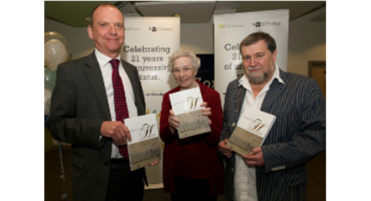 Vice-Chancellor, Professor Geoff Layer, Sheila Holgate-Wright and Professor Mike Haynes with the copies of 'Opening Doors in the Heartlands: A History of the University of Wolverhampton'.