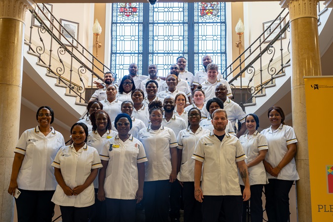 Picture of nursing graduates on the stairs at Wulfruna House