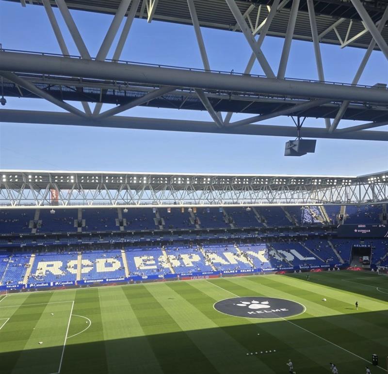 Espanyol Stadium football pitch in Spain. The photo of the empty pitch is taken from the stalls on a bright day during a tour of the stadium