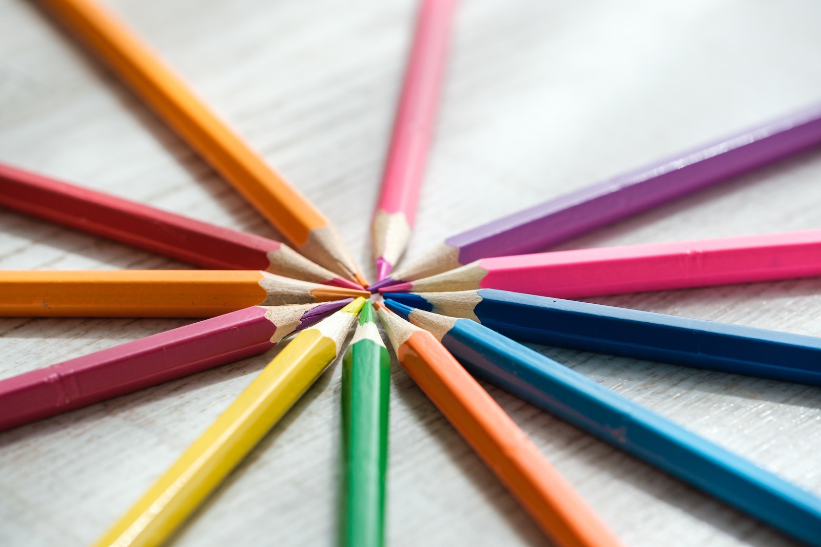 Header image of a circle of coloured wooden pencils