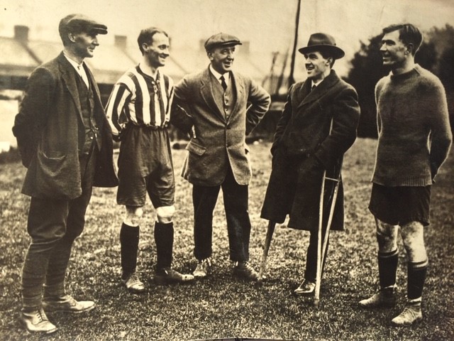 Billy Smith (pictured 2nd right) on his return to St James Park