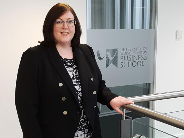 A photograph of Claire Schofield in the University of Wolverhampton Business School building