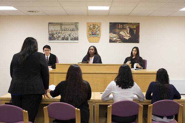 Students in the Law School's mock courtroom.