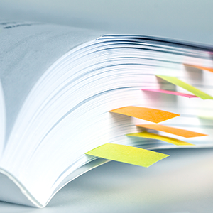 Notebook with post it note bookmarks