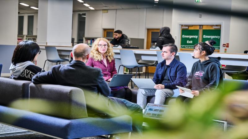 students and staff meeting