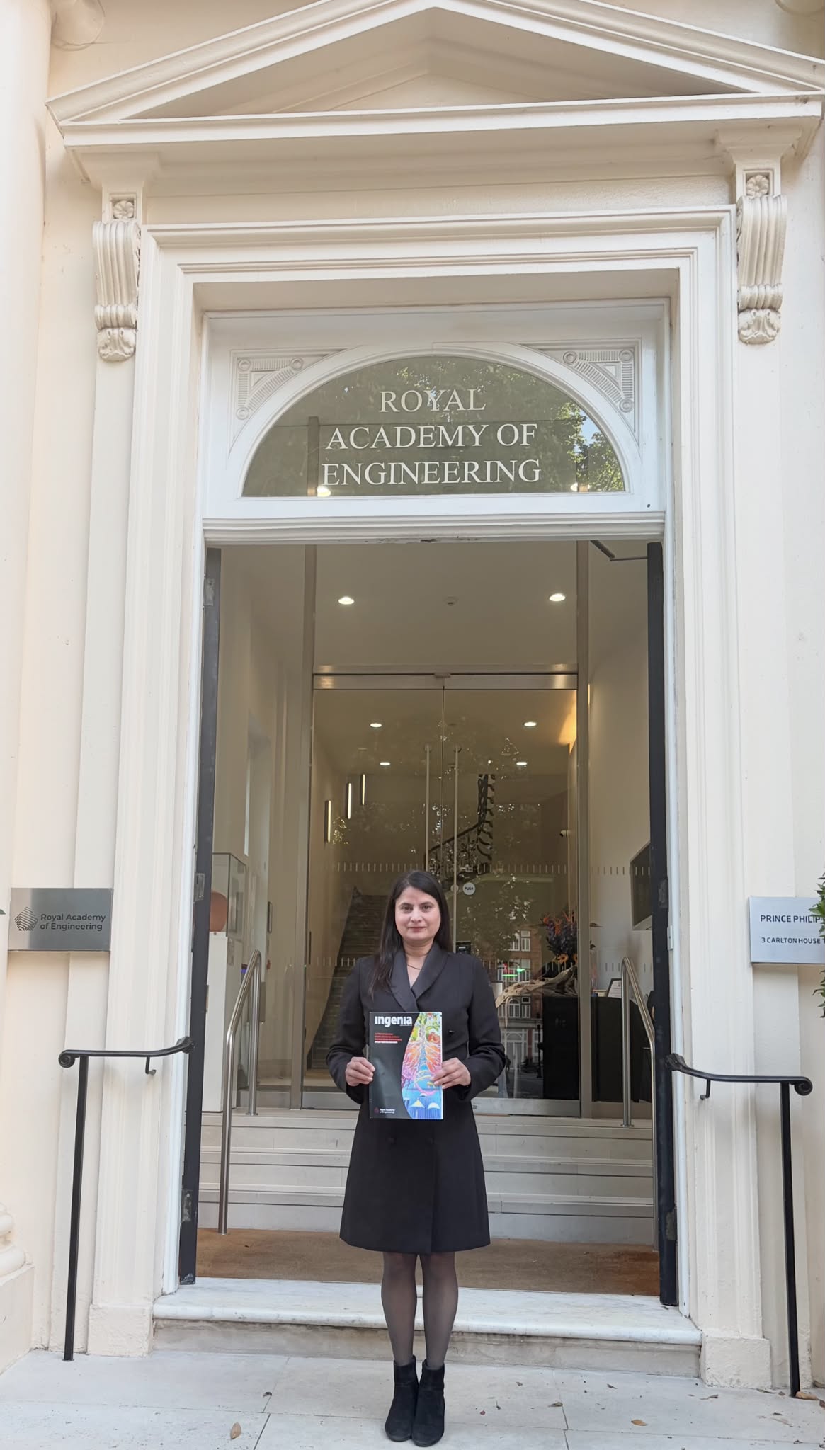 Kiran Gulia outside The Royal Academy of Engineering with her publication