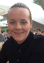 Headshot photograph of Ali Forbes