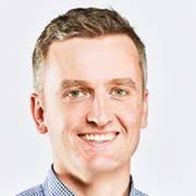 Headshot photograph of Ross Cloak