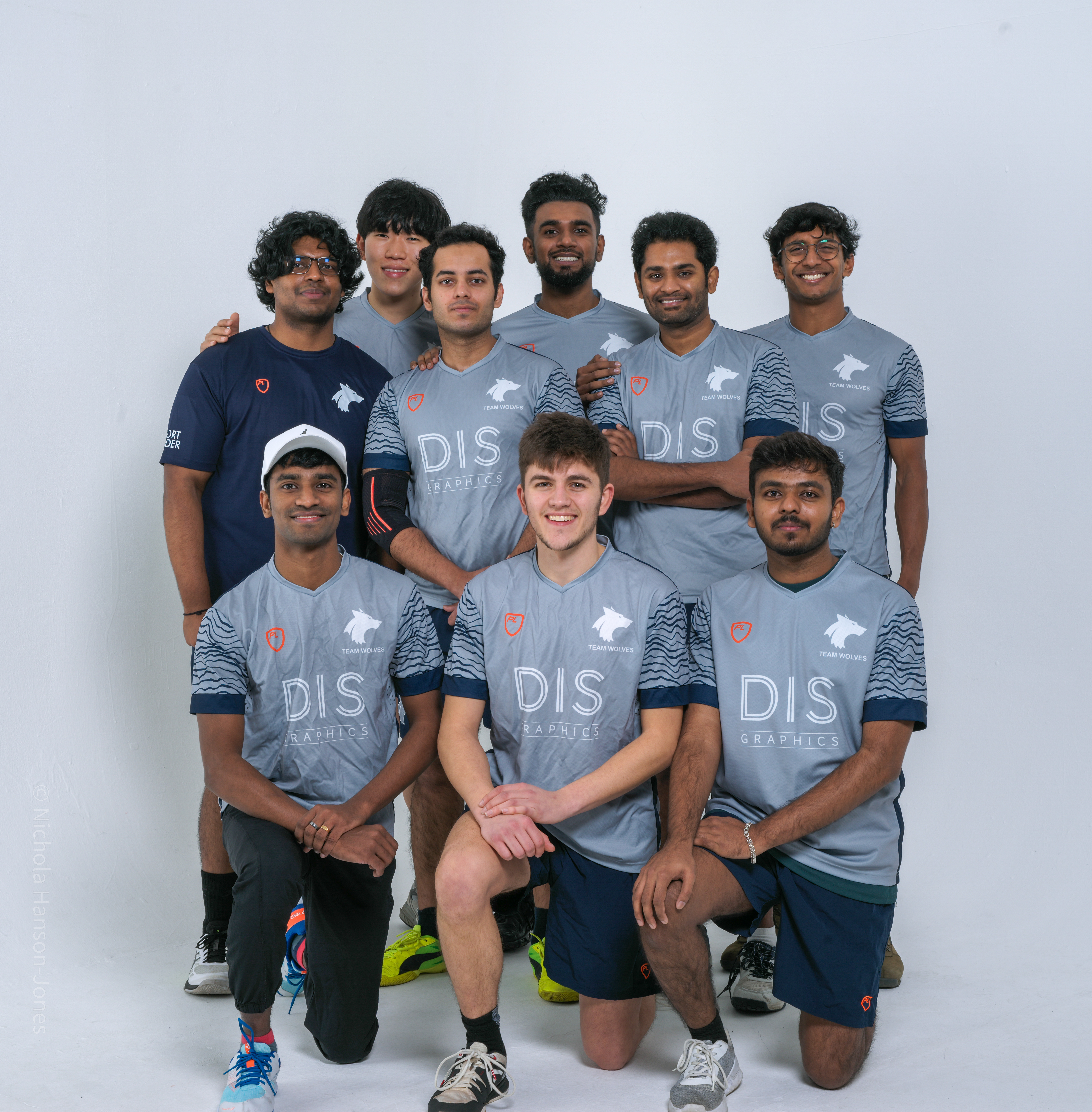 Photograph of the University of Wolverhampton men badminton team for 2023-24, posed together wearing matching grey uniforms.