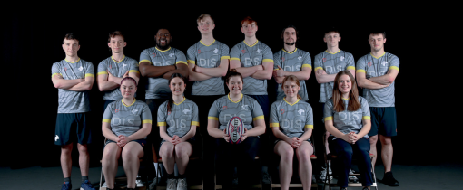 Photograph of the University of Wolverhampton rugby team for 2023-24, posed together wearing matching grey uniforms with yellow details.