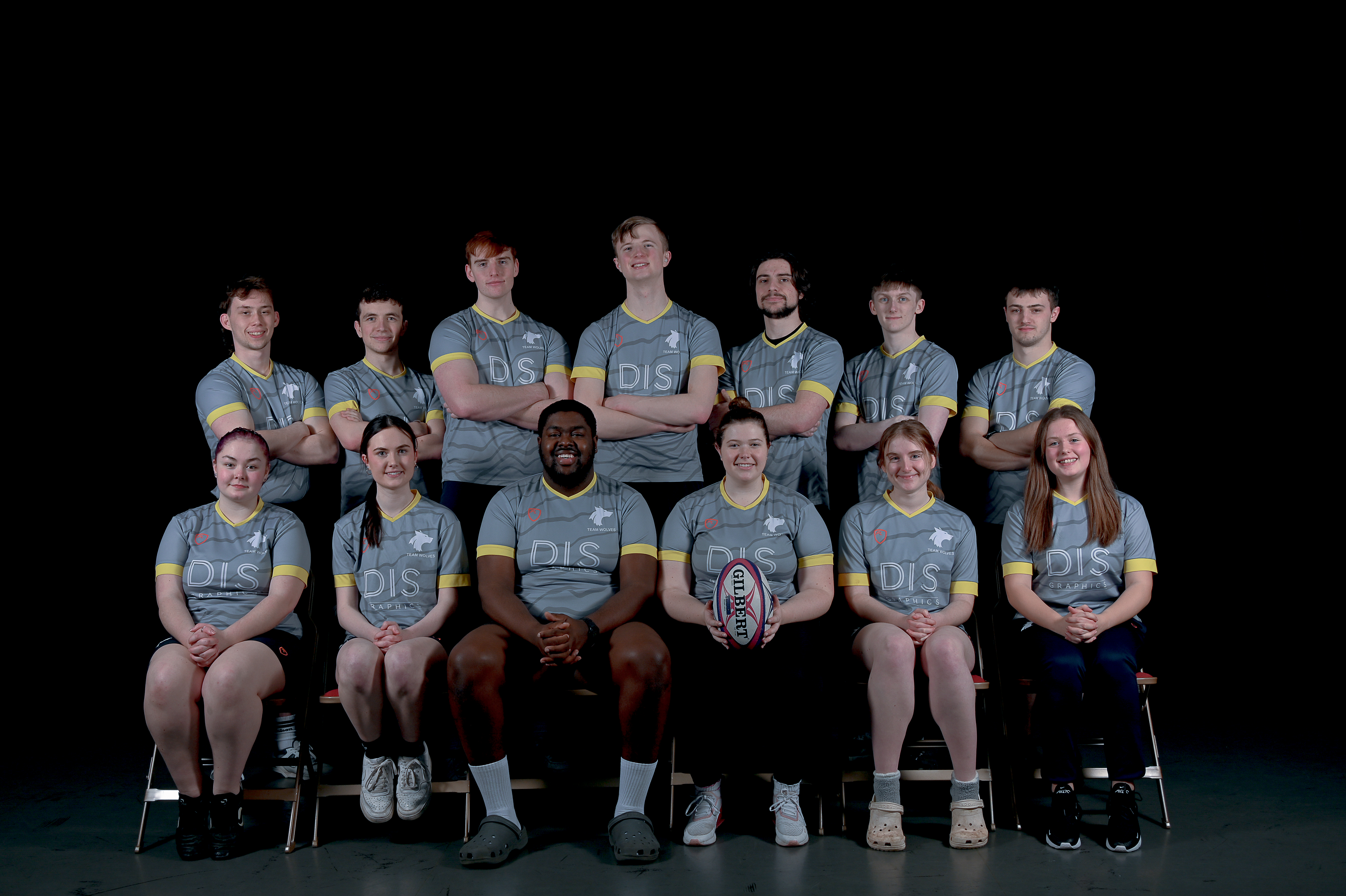 Photograph of the University of Wolverhampton rugby team for 2023-24, posed together wearing matching grey uniforms with yellow details.