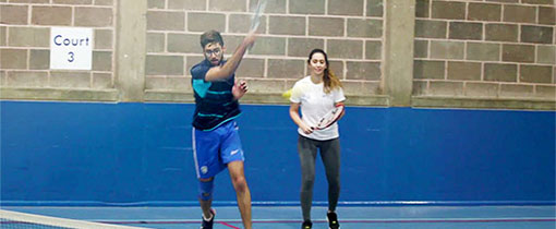 Sohaib Farooqui playing tennis at the indoor court in City Campus