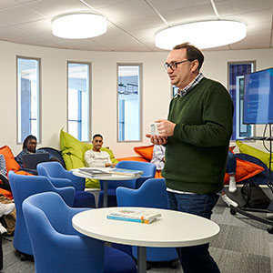Staff member teaching a class in Housman Building
