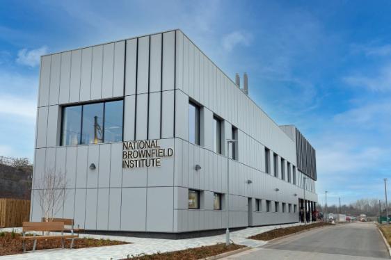 Exterior of the National Brownfield Institute building, with its name displayed as a sign on the side of the building
