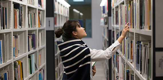 International student in library