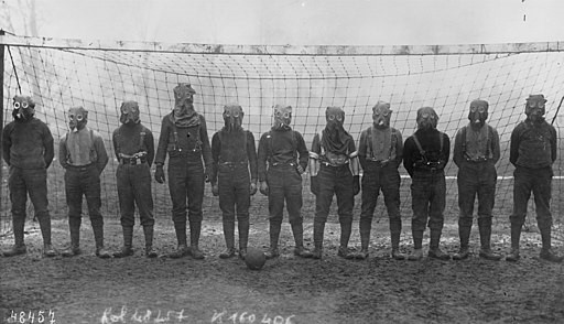 Army Football Team wearing PH Helmet Gas Hoods, 1916