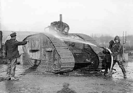 Volunteer Chinese labourers cleaning a British tank in 1917