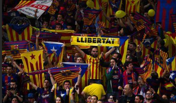 Barcelona Fans with Catalonian Flags demanding 
