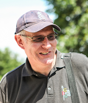 Steve Hunnisett Smiling in a photograph