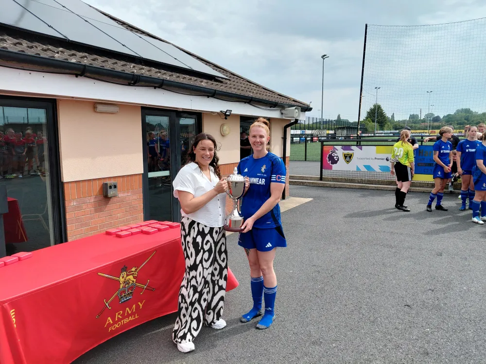 REME Captain, Amber Marsh with the Corporal Channing Day League Trophy.