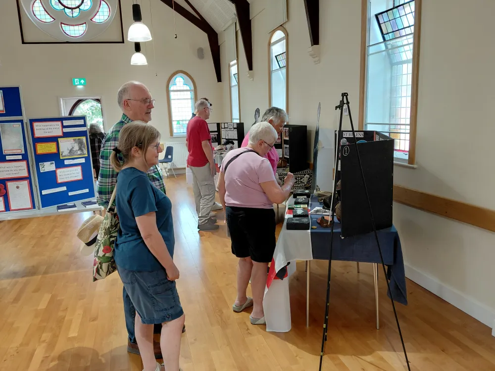 Exhibition Attendees Learning About The History of Women’s Football