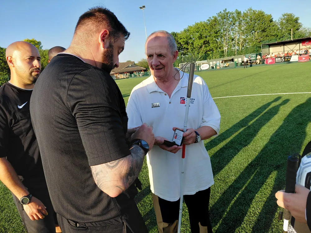 Blind Veteran Jules Presenting the Commemorative Coin