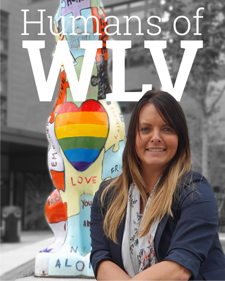 Claire Dickens, one of our WLV Human stories, smiles for a photograph in front of the Humans of WLV text.