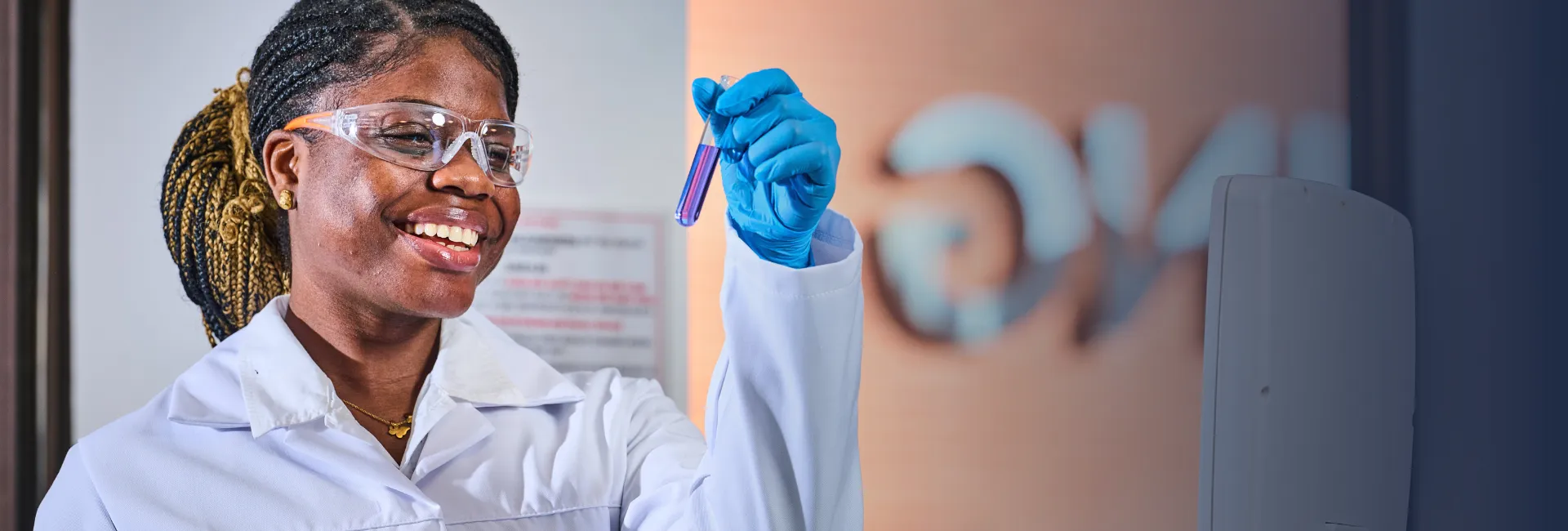 Pharmacy student looking at samples